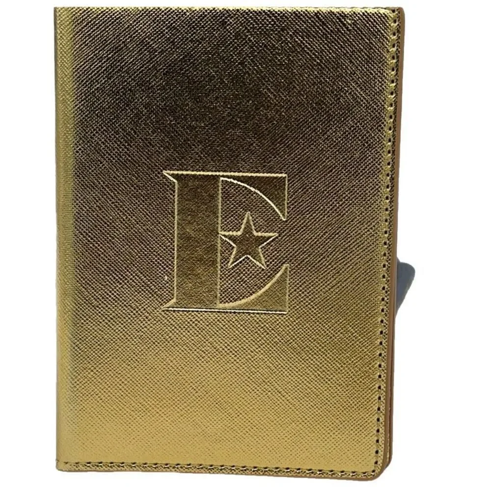 Vintage Elton John gold colored passport cover.